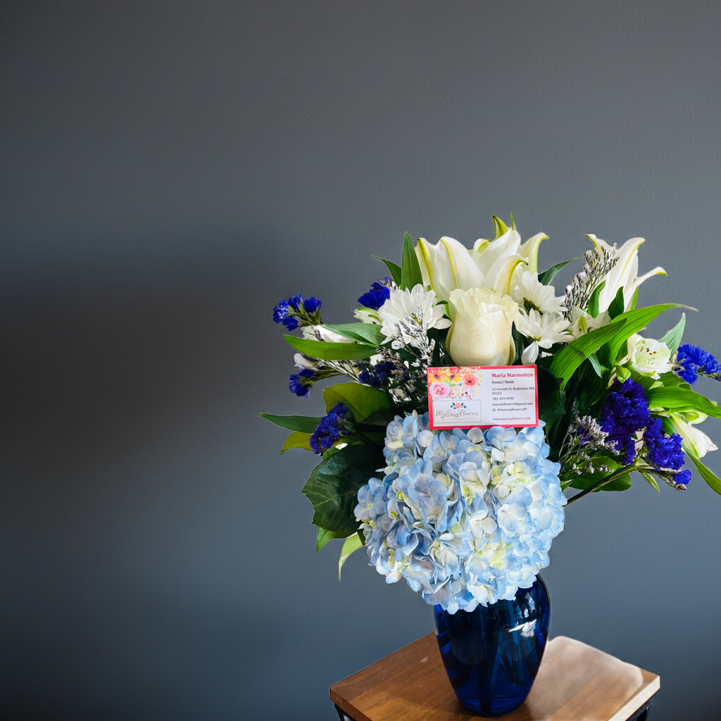 ELEGANT DESIGNER CHOICE IN BLUE VASE