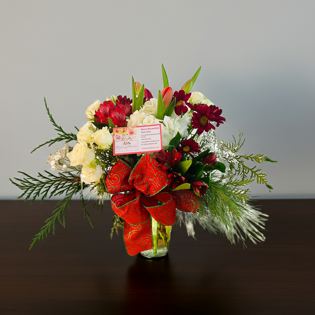 CHRISTMAS DESIGNER CHOICE IN CLEAR VASE. - BEST SELLER